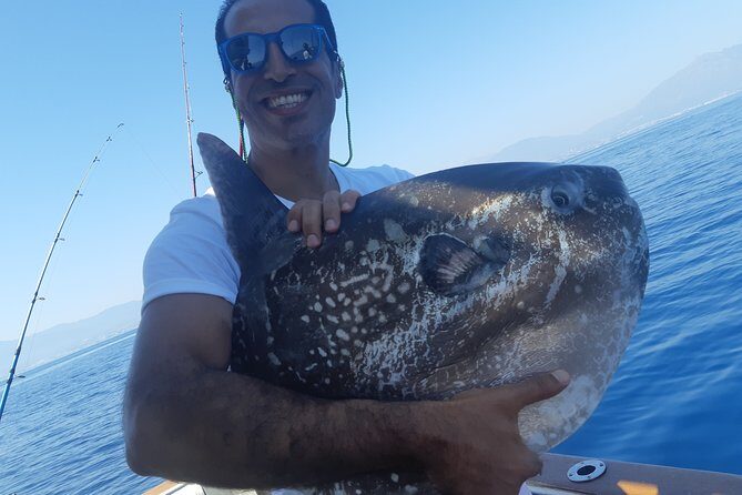 4 Hours Bottom Fishing Day by boat from Marbella - Swimming and Paddle Time: When the Boat Moors Up