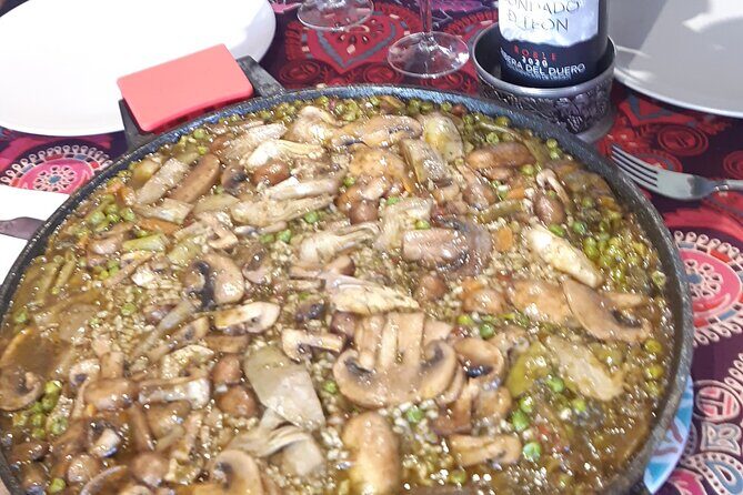 Chefcooking Paella from our Andalusian Grandmother at a Family Farm - What you take home: a recipe book you’ll actually use