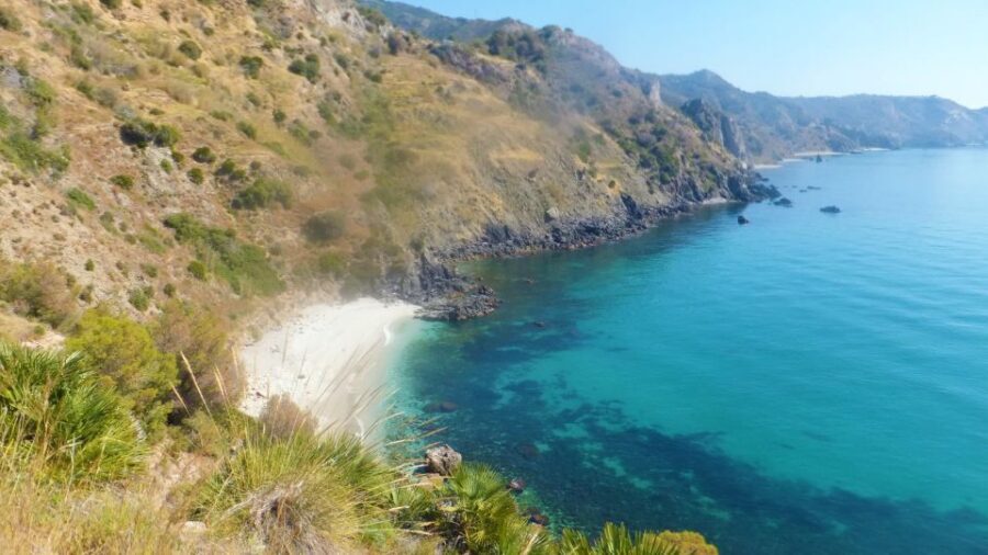 From Malaga: Cliffs of Maro Hike w/ Beach Visit & Snorkeling - The payoff: reaching a secluded white-sand beach for swimming