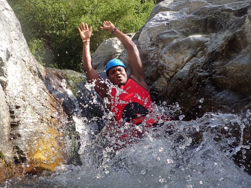From Marbella: Guadalmina River Guided Canyoning Adventure - Entering the Canyon of the Angosturas: Swim Spots, Slides, and Optional Jumps