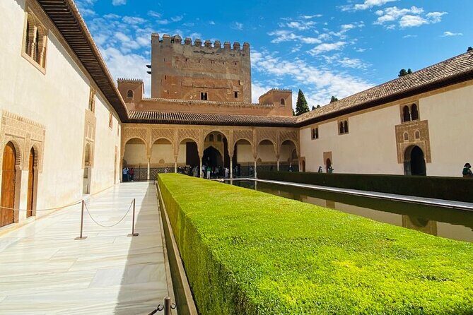 Full-Day Alhambra from Malaga: Choose Your Access & Pick Up Point - Pick the right tour option: Essential vs Full Nasrid Palaces
