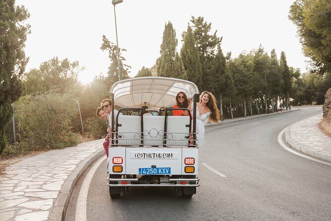 Malaga Express Tour with Local Guide in Eco Tuk Tuk Private - La Farola and La Malagueta Beach: The Sea Side of Malaga