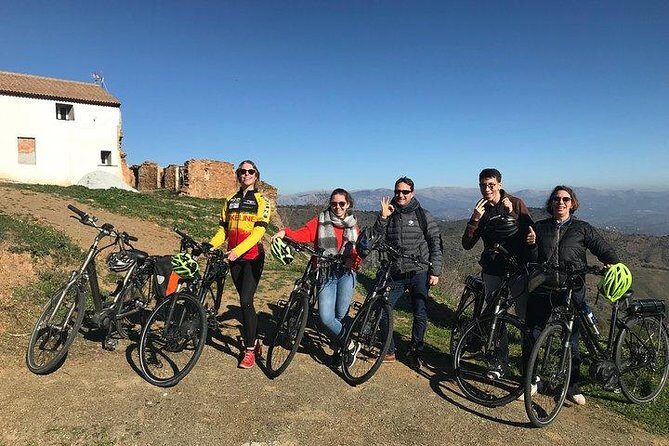 Malaga Highest Peak E-Bike Tour: White Village Olias and El Palo - Olias: calm village vibes and a well-timed pause