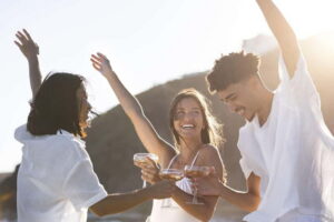 Malaga: Sailing Catamaran Sunset Cruise with Live DJ & Drink - Sailing the Costa del Sol as the sky turns orange