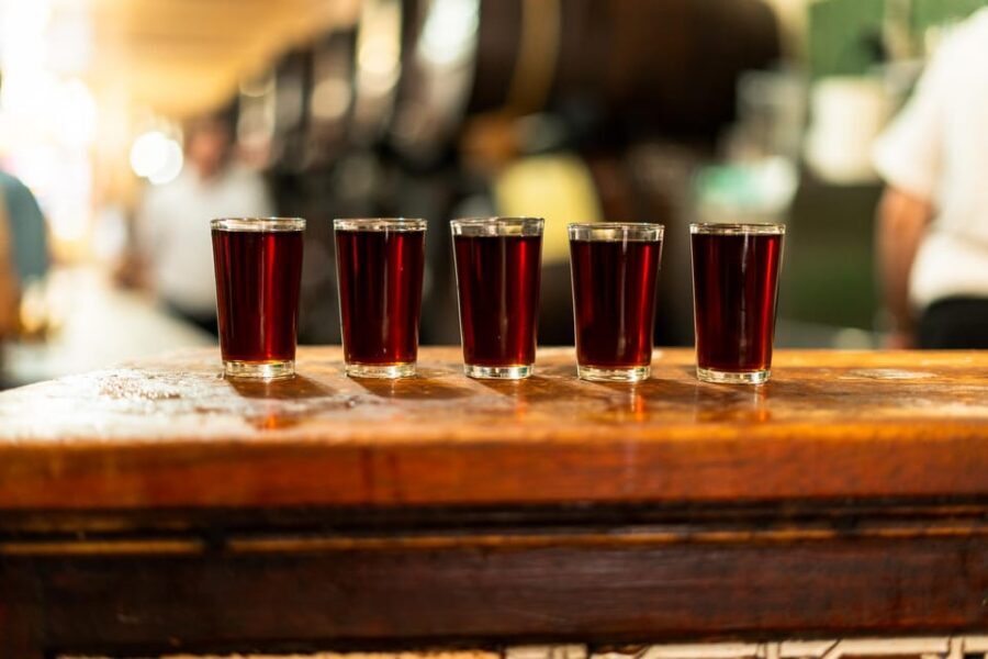 Malaga: Wine and Tapas Tour with Tastings and Drinks - First Tapas Stop: Typical Malaga Bites to Warm Up