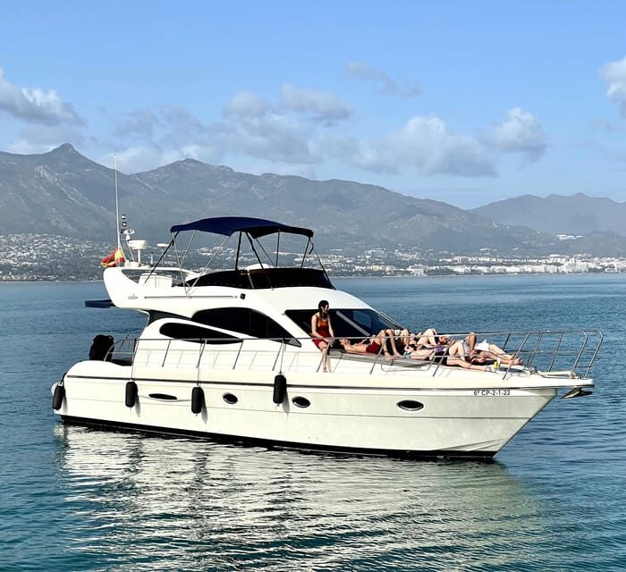 Marbella: Private Cruise in Yacht - Included Water Time: Paddle Surfing, Snorkel, and Fishing Gear