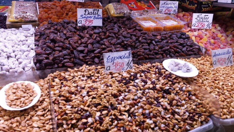 Tapas Tour Paella and Malaga market with Official Guide - Atarazanas Central Market: ham, cheese, olives, and bay fish up close